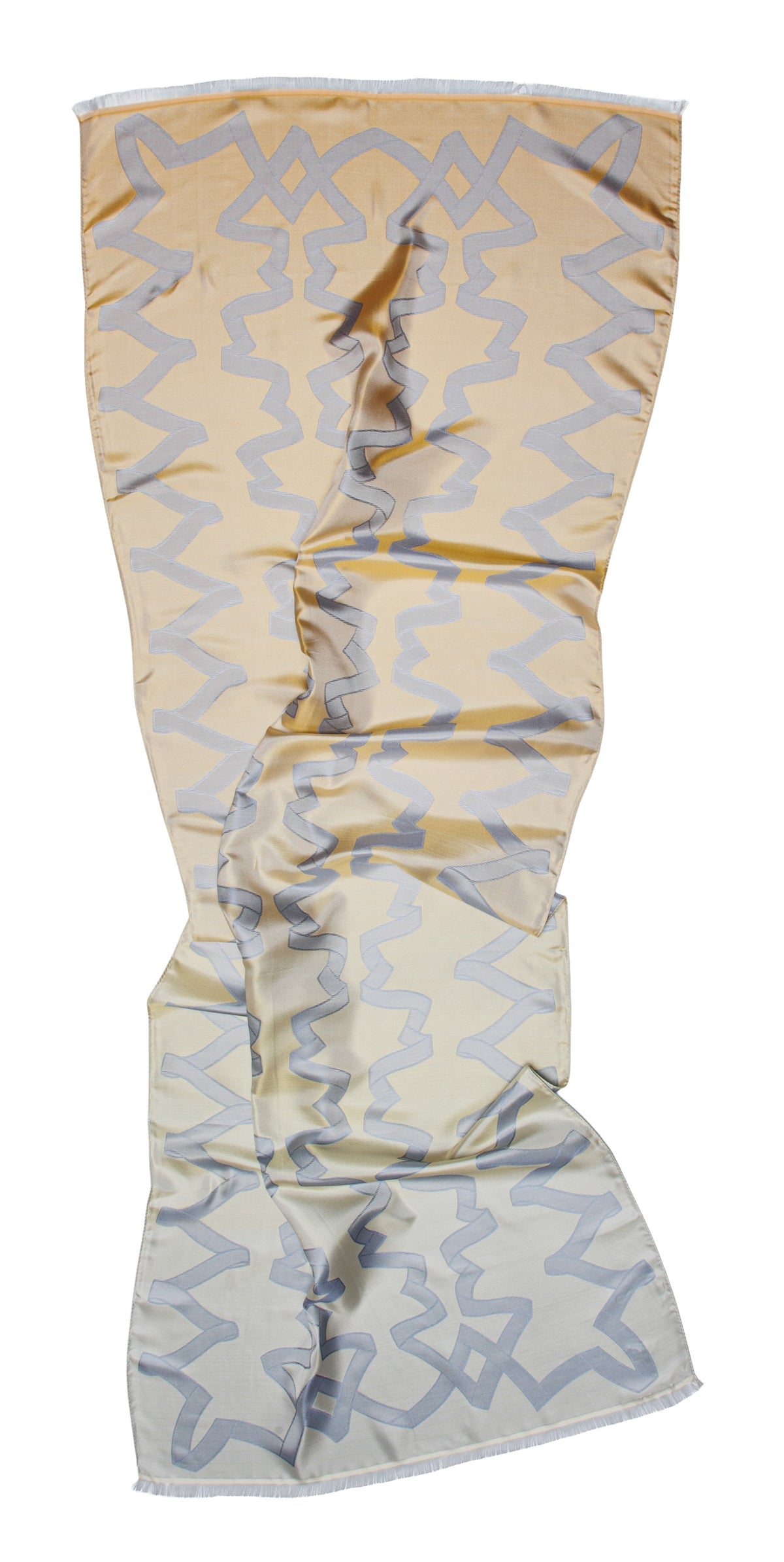 A lightweight scarf with a beige and light blue geometric zigzag pattern, draped vertically against a plain white background.