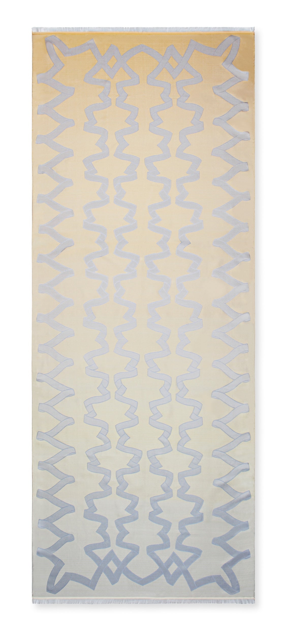 A rectangular area rug with a cream and beige background featuring a repeating vertical pattern of light blue geometric zigzag and star-like motifs.